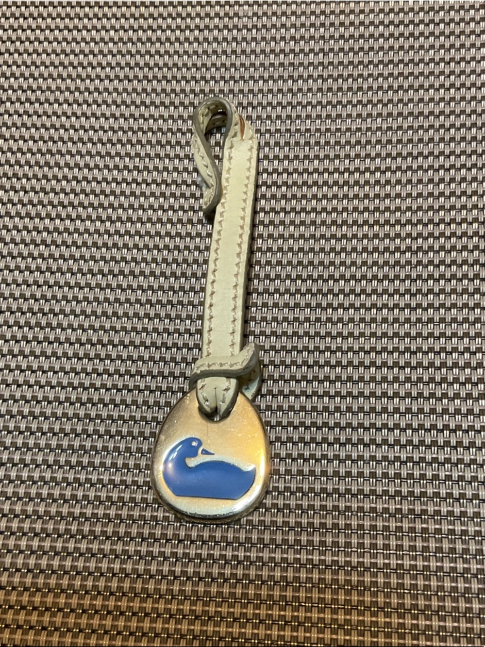Dooney & Bourke Blue Duck Charm with Cream Strap